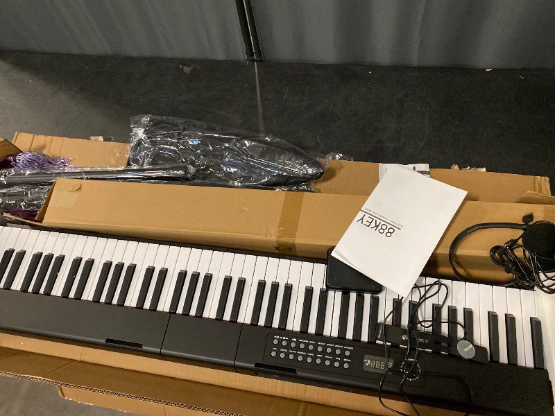 Photo 1 of 88 Key Keyboard Piano, Semi Weighted Electronic Digital Piano with Music Stand, Power Supply, Sustain Pedal, Stand, Bluetooth, Carrying Case, Headphones, USB-MIDI, Piano Lessons for Beginners