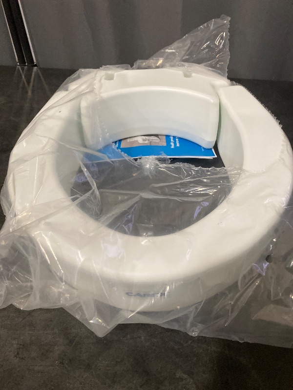 Photo 1 of Carex Elongated Hinged Toilet Seat Riser, Adds 3.5 Inches of Height to Toilet, 300 Pound Weight Capacity, Raised Toilet Seat