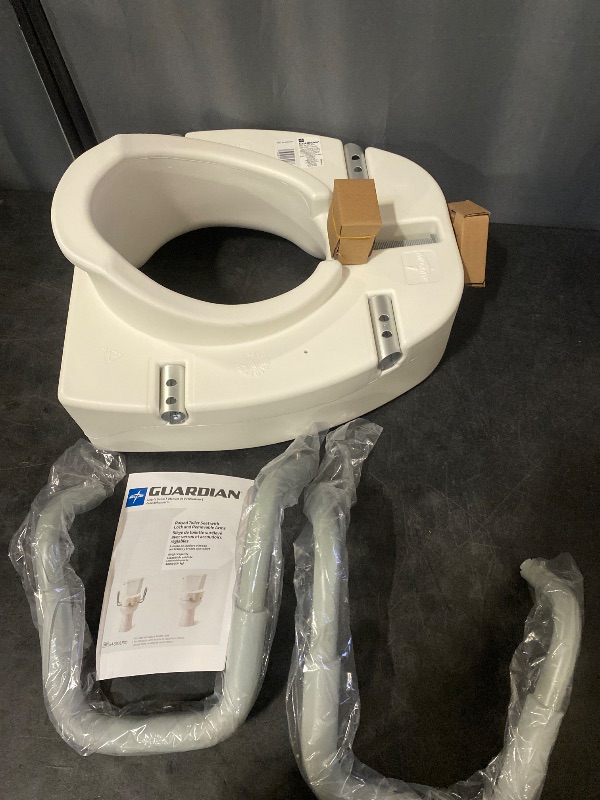 Photo 1 of Medline 5" Elongated Raised Toilet Seat, with Lock and Removable Padded Arms- A Medical Seat for Seniors, Elderly, Adults, or Post-Surgery Recovery, 1 Ct.