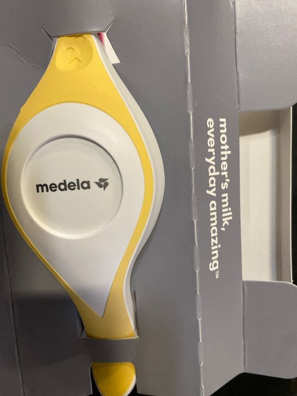 Photo 1 of Medela Harmony Manual Breast Pump, Compact Swiss Design with PersonalFit Flex Shields and Medela's 2-Phase Expression Technology