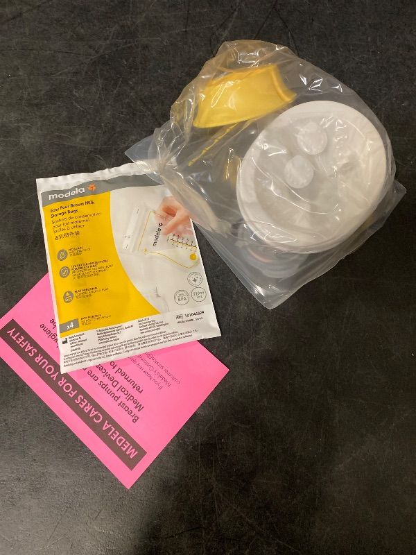 Photo 1 of Medela Harmony Manual Breast Pump, Compact Swiss Design with PersonalFit Flex Shields and Medela's 2-Phase Expression Technology