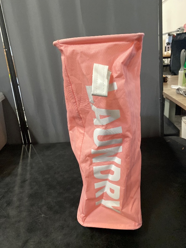 Photo 1 of Caroeas Slim Laundry Baskets on Wheels , Foldable Corner Storage Bins, Rolling Laundry Hamper with Leather Handle(Pink)
