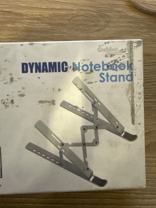 Photo 1 of Laptop Stand Lifter Foldable Aluminum Desktop Holder Stand Angle Adjustable Tablet PC Holder Riser Ventilated Laptop Phone Tray, Silver