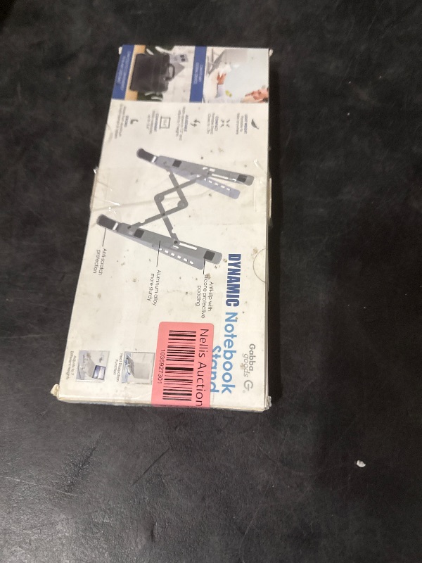 Photo 1 of Laptop Stand Lifter Foldable Aluminum Desktop Holder Stand Angle Adjustable Tablet PC Holder Riser Ventilated Laptop Phone Tray, Silver