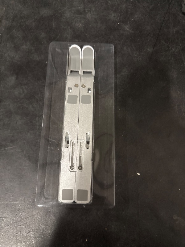 Photo 1 of Laptop Stand Lifter Foldable Aluminum Desktop Holder Stand Angle Adjustable Tablet PC Holder Riser Ventilated Laptop Phone Tray, Silver