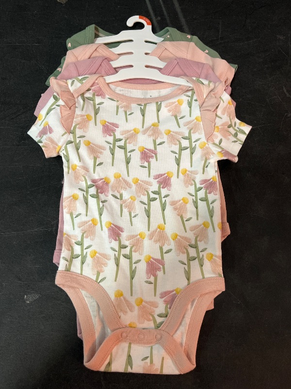 Photo 1 of 6-9M Baby 4pk Floral Short Sleeve Cotton Bodysuit - Cloud Island™ Pink 6-9M: Hearts Pattern, Lap Shoulder, Crotch Snap Closure