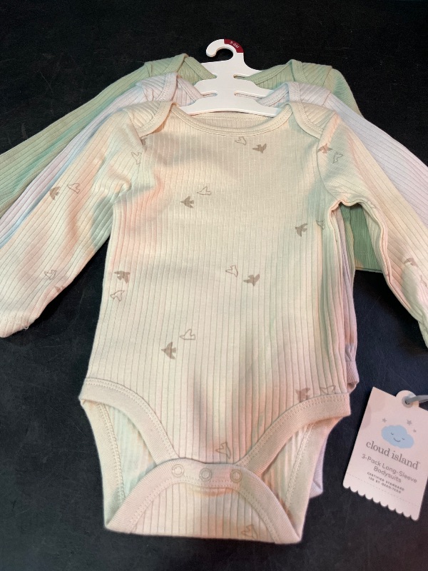 Photo 1 of 3-6M Baby 3pk Solid Long Sleeve Wide Ribbed Bodysuit - Cloud Island™ 3-6M: Cotton, Midweight, Crotch Snap, Lap Shoulder