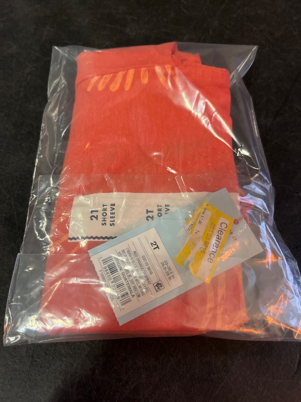 Photo 1 of 2T Toddler Boys' Surf Twill Patch Oversized T-Shirt - Cat & Jack™ Orange 2T
