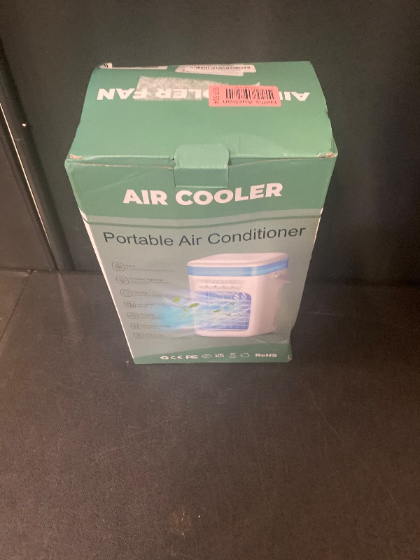 Photo 1 of Portable Air Conditioner,Cooling Fan with 3 Speeds & 3 Modes,1500ML Mini Air Conditioner with Remote, Air Conditioner Fan,Night Light,Evaporative Air Cooler for Home/Office