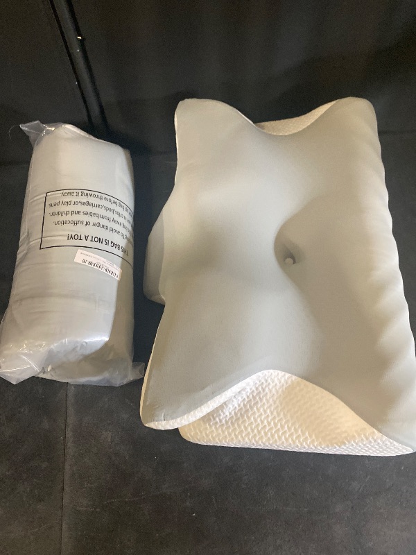 Photo 1 of Cervical Neck Pillow for Pain Relief Sleeping, Ergonomic Memory Foam Pillows, Orthopedic Contour Neck Support Pillows with Cooling Pillowcase for Side, Back, and Stomach Sleeper, White