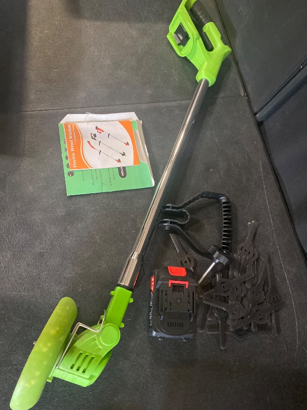 Photo 1 of BLACK+DECKER String Trimmer Weed Wacker with Auto Feed Weed Eater, 6.5-Amp, 14-Inch