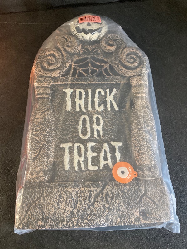 Photo 1 of Hyde & Eek! Boutique Trick or Treat Light Up Foam Tombstone Halloween Decorative Prop