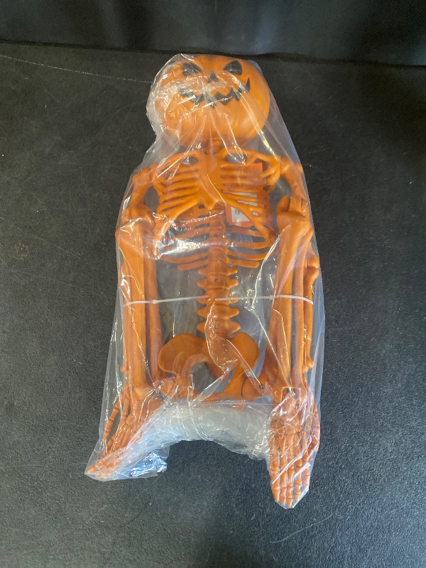 Photo 1 of 60" Poseable Lifesize Pumpkin Skeleton Halloween Decorative Prop Orange - Hyde and EEK! Boutique™