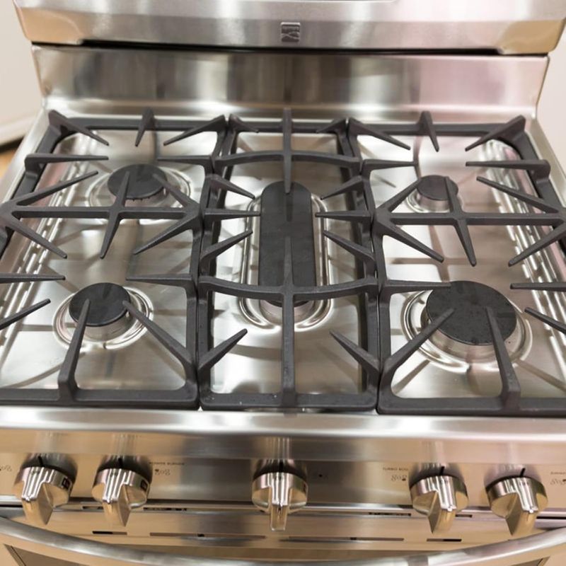 Photo 1 of Upgraded A00263801 Grate Replacement for Kenmore Stove Parts Range Burner Grate, Frigidaire Gas Range Parts Cast Iron Center Grate Gas Cooktop Parts Stove Top Grate Cookware Accessories 1 Pack