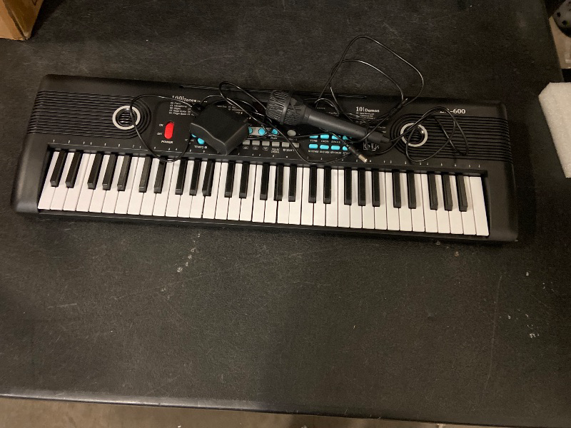 Photo 1 of 61 key keyboard Piano,Portable Electronic Digital Piano,Built In Dual Speakers,External Microphone,Power Plug,Rich Teaching Content,Multi-Functional Electronic Piano Suitable For Beginners (Black)