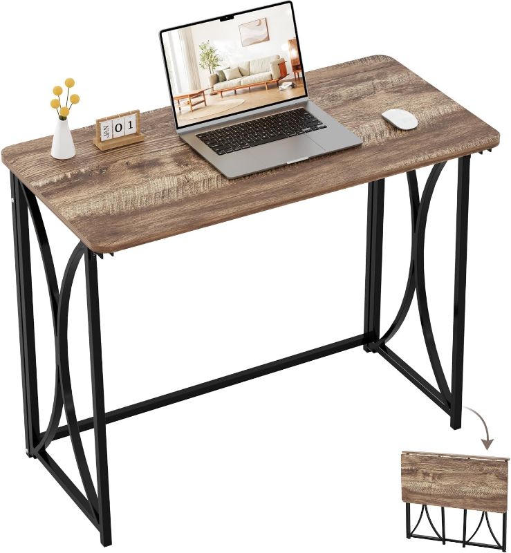 Photo 1 of Small Desk, 31.5" Folding Table for Bedroom, Space Saving Folding Computer Desk for Home Office, Easy Assembly, Light Brown