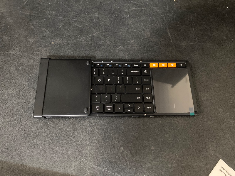 Photo 1 of ProtoArc Foldable Keyboard with Touchpad, XK01 TP Folding Portable Keyboard, Full Size Keys, Large Trackpad Bluetooth Travel Keyboards for Laptop PC Tablet - Black