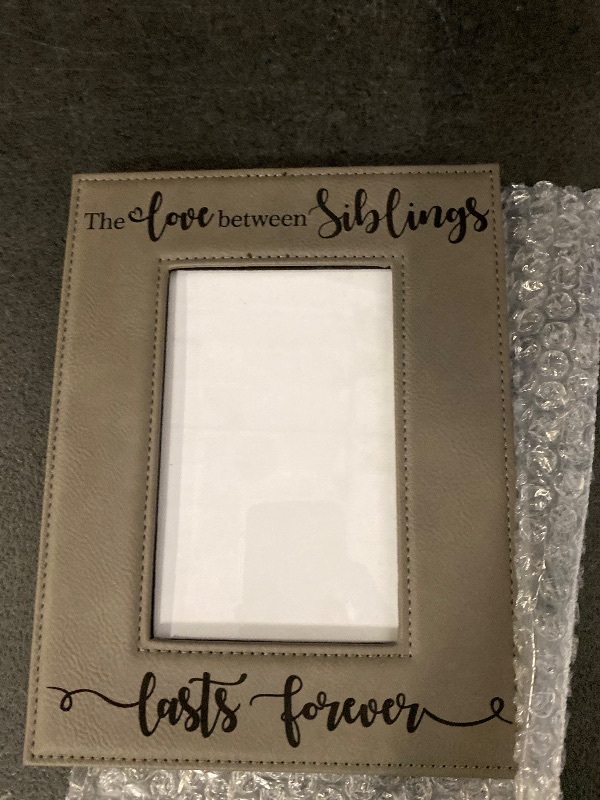 Photo 1 of Bella Busta -The Love Between Siblings Lasts Forever_ Engraved Leather Picture Frame (4x6 Vertical)