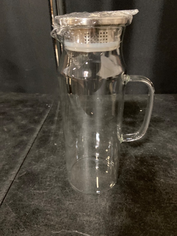 Photo 1 of Bivvclaz 2 Liter 68 oz Glass Pitcher with Lid and Handle, Glass Carafe for Hot/Cold Water, Large Iced Tea Pitcher for Coffee, Juice and Homemade Beverage