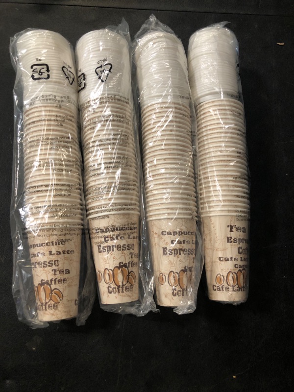 Photo 1 of Amazon Basics To Go Hot Paper Coffee Cups with Lids, 16 oz, Café Design, Disposable, 100-Count