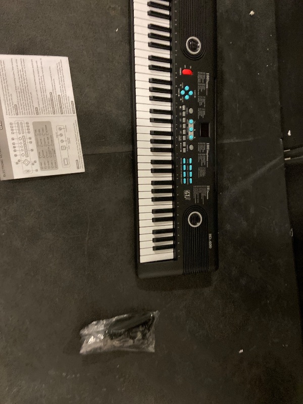 Photo 1 of 61 Keys Piano Keyboard with Built-in Speaker & Microphone, Beginner-Friendly Portable Electronic Digital Piano with Teaching Features, Ideal Gift for Aspiring Musicians
