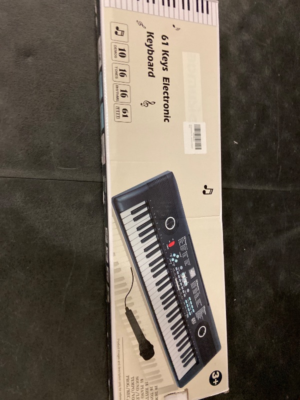 Photo 1 of 61 Keys Piano Keyboard with Built-in Speaker & Microphone, Beginner-Friendly Portable Electronic Digital Piano with Teaching Features, Ideal Gift for Aspiring Musicians