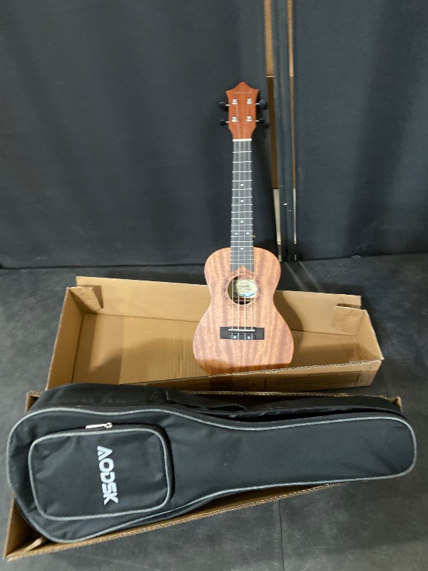Photo 1 of AODSK Concert Ukulele for Beginner 23 Inch Ukelele Kit with Gig Bag StrapTuner Nylon String 4 Picks Cloth Online Lesson Holiday Gift