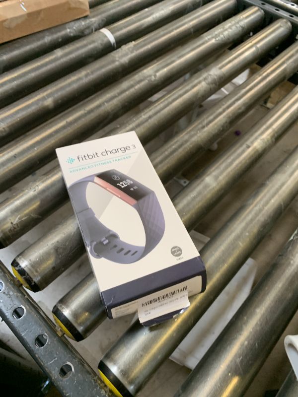 Photo 1 of Fitbit Charge 3 Fitness Activity Tracker, Rose Gold/Blue Grey, One Size (S and L Bands Included)