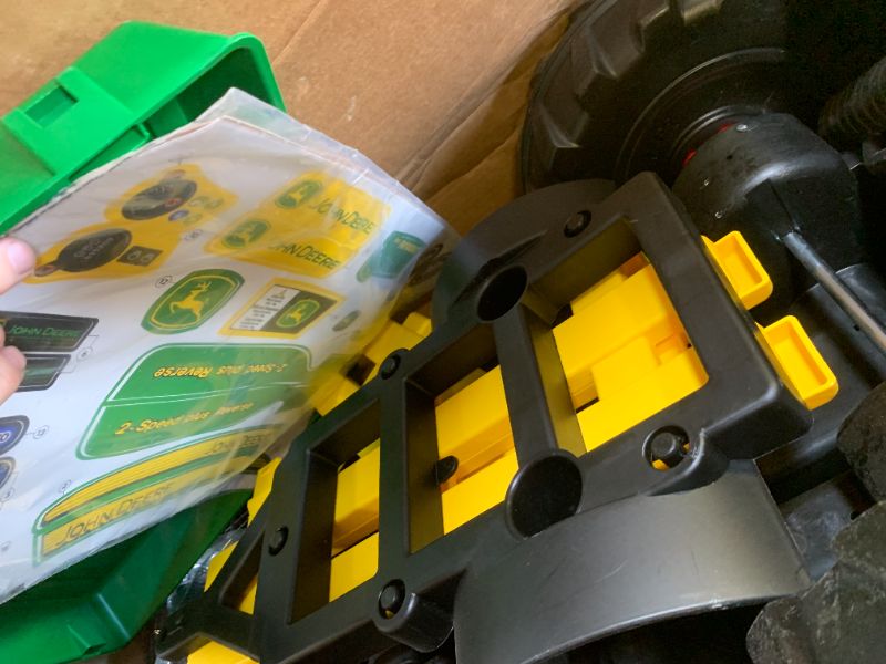 Photo 1 of Peg Perego John Deere Ground Force Tractor with Trailer 12 Volt Ride on