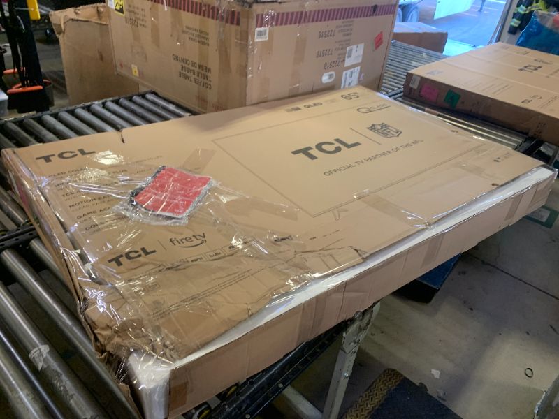 Photo 1 of TCL 65-Inch Class Q65 QLED 4K Smart TV with Fire TV (65Q651F, 2024 Model), Dolby Vision, HDR PRO+, Dolby Atmos, Alexa Built-in with Voice Remote, Apple AirPlay 2 Compatibility, Streaming Television