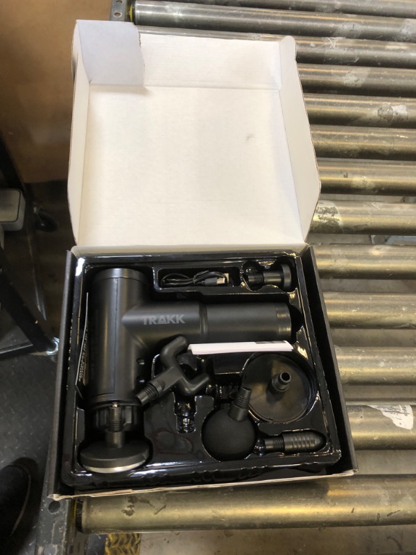 Photo 1 of ITEM DOE SNOT WORK PARTS ONLY !!!!!------------------TRAKK Beast Cordless Hot and Cold Percussion Massager, 6 Intensity Levels, Deep Tissue Massage Gun, Black
