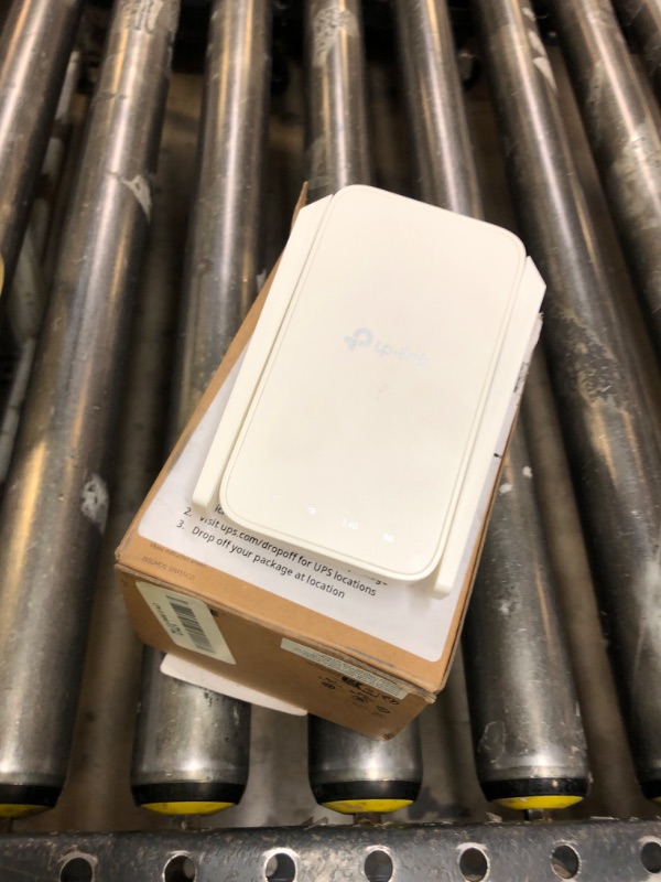Photo 1 of TP link wi-fi signal  extender 