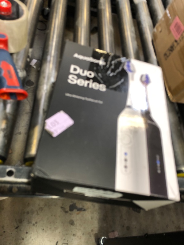 Photo 1 of Aquasonic Duo - Dual Handle Ultra Whitening 40,000 VPM Wireless Charging Electric ToothBrushes - 3 Modes with Smart Timers - 10 Dupont Brush Heads & 2 Travel Cases Included