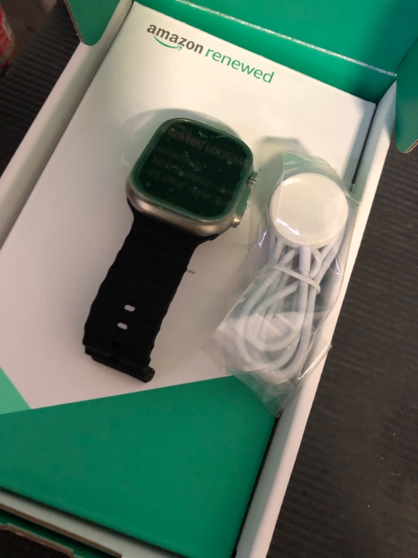 Photo 1 of Apple Watch Ultra [GPS + Cellular 49mm] Titanium Case with Midnight Ocean Band, One Size (Renewed Premium)