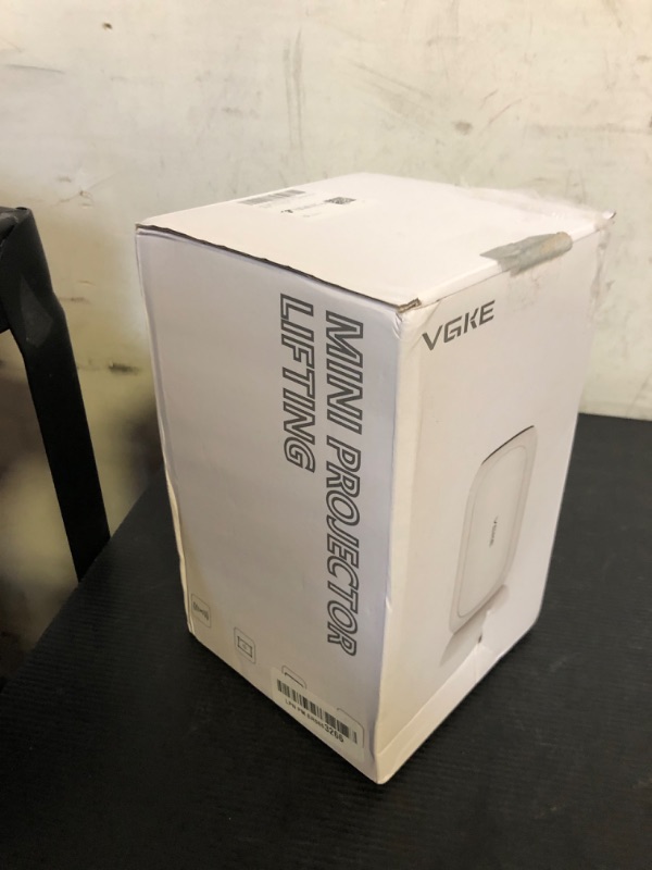 Photo 1 of ?3D TOF Auto Focus & Built-in Android TV 13.0?VGKE Mini Projector, Portable Projector with WiFi 6 and Bluetooth, 4K Support, Auto Keystone, Compatible with HDMI/USB/TV Stick for Home and Outdoor Use