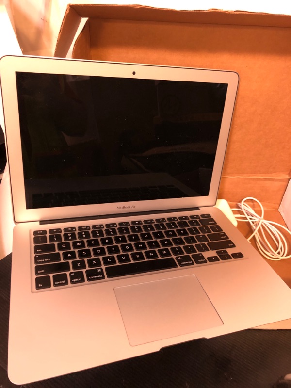 Photo 1 of Apple MacBook Air MJVE2LL/A 13-inch Laptop (1.6GHz Core i5,8GB RAM,128GB SSD) (Renewed)