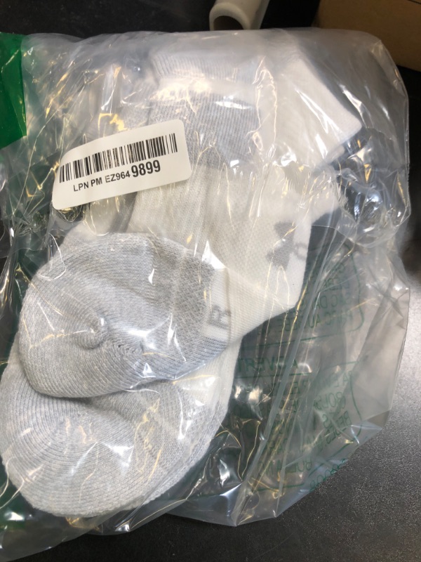 Photo 1 of Under Armour Unisex-Adult Performance Tech Pro No Show Socks 3 Pack, (100) White/White/Mod Gray, Large