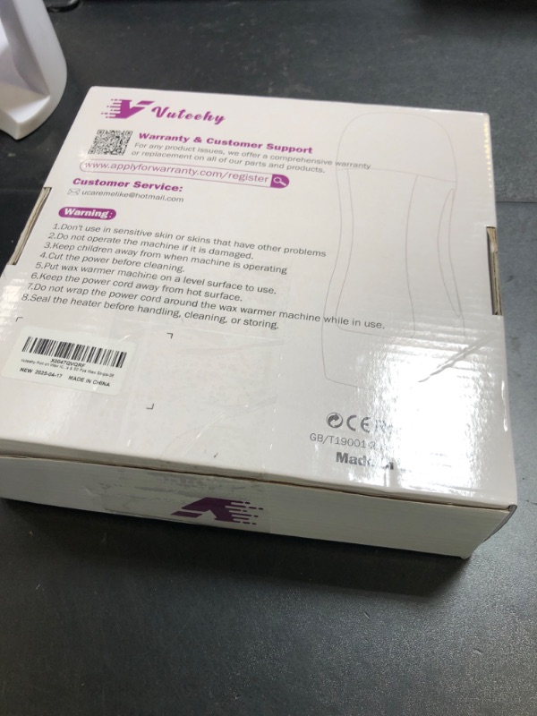 Photo 1 of Vuteehy Roll on Wax Kit, Roll on Waxing Kit for Hair Removal, Sensitive Skin Roll on Waxing Kit for Women, At Home Wax Kit for Larger Areas of the Body, with 50 Pcs Strips and 2 Honey Cartridge