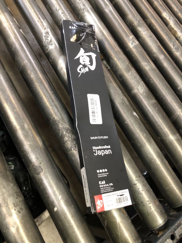 Photo 1 of Shun Premier 8" Chef's Knife, Handcrafted Japanese Kitchen Knife for Professional and Home Chefs, VG-MAX Core with Damascus Stainless Steel Cladding, Pakkawood Handle