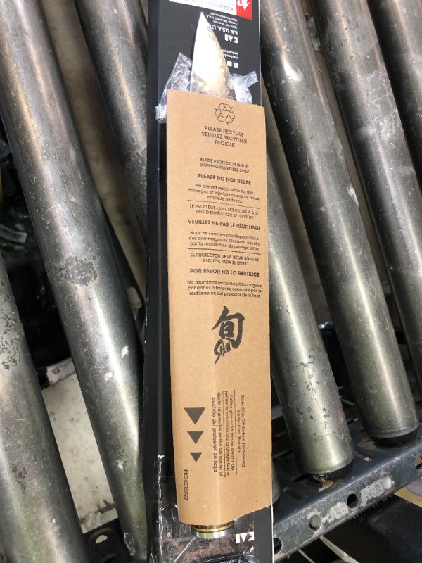 Photo 1 of Shun Premier 8" Chef's Knife, Handcrafted Japanese Kitchen Knife for Professional and Home Chefs, VG-MAX Core with Damascus Stainless Steel Cladding, Pakkawood Handle