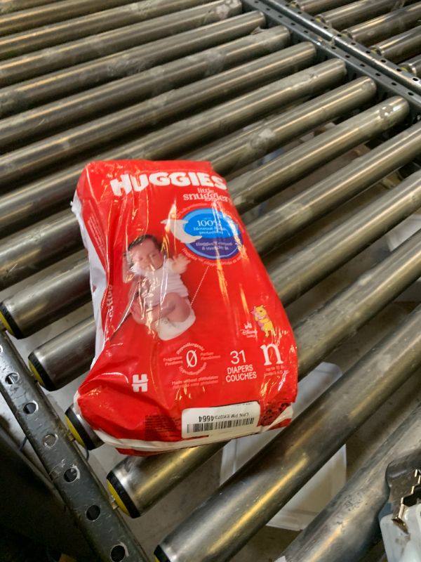 Photo 1 of Huggies Size Newborn Diapers, Little Snugglers Baby Diapers, Size Newborn (up to 10 lbs), 31 Count, Packaging May Vary