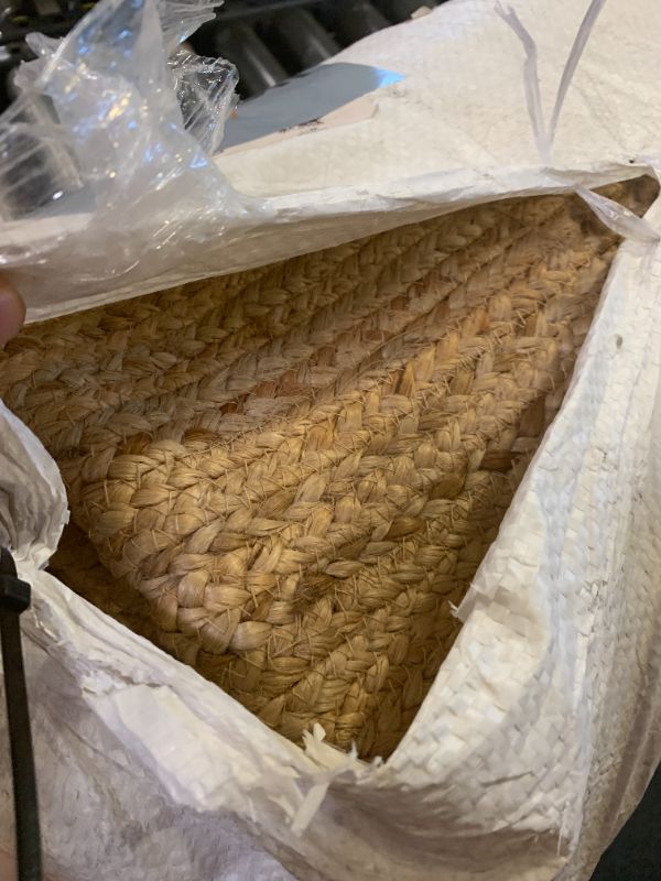 Photo 1 of natural woven jute rug 