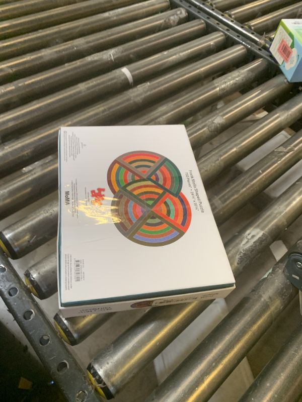Photo 1 of Galison MoMA Frank Stella Shaped Jigsaw Puzzle, 750 Pieces, 24 1/2” x 16 1/4” – Colorful Geometric Painting, Die-Cut Puzzle
