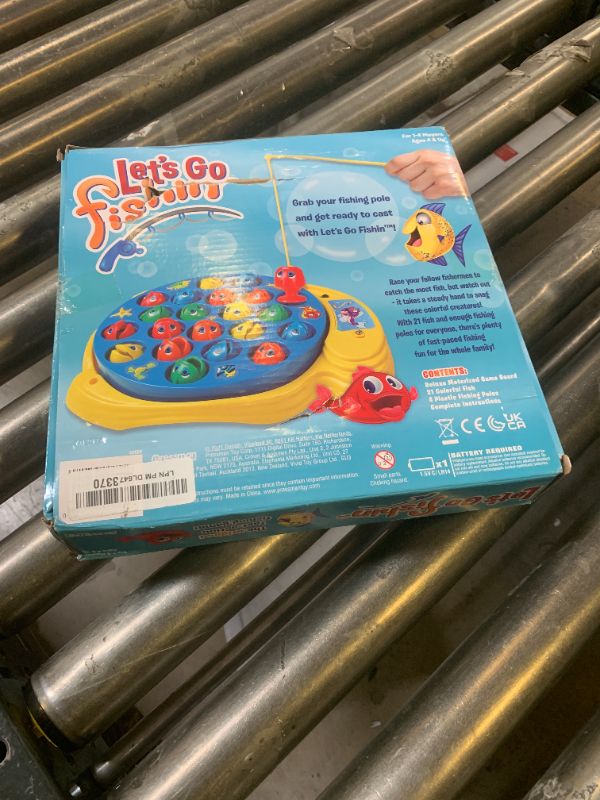 Photo 1 of Let's Go Fishin' Game by Pressman - The Original Fast-Action Fishing Game!, 1-4 players