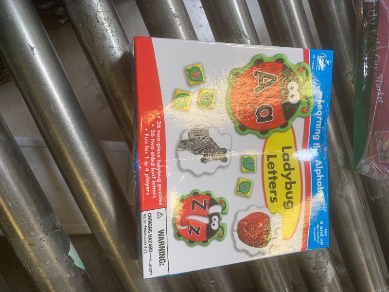 Photo 1 of Carson Dellosa Lady Bug Letters Game, 26 2-Sided Ladybugs and Leaves Alphabet Puzzle, abc Kindergarten and Preschool Learning Activities for Toddlers Ages 4+
