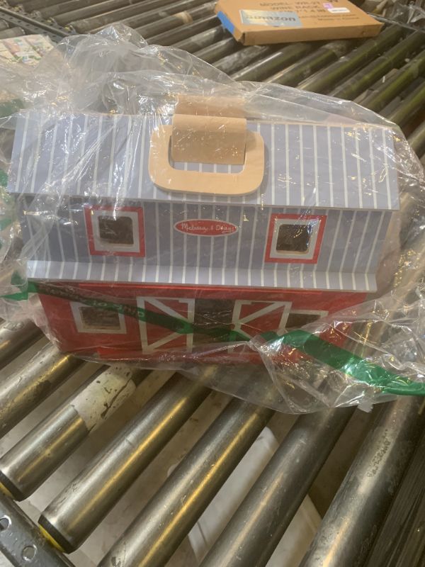 Photo 1 of Melissa & Doug Fold and Go Wooden Barn with 7 Animal Play Figures - Farm Animals Barn Toy, Portable Toys, Farm Toys for Kids and Toddlers Ages 3+