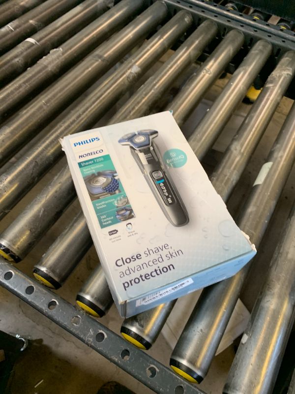Photo 1 of Philips Norelco Shaver 7200, Rechargeable Wet & Dry Electric Shaver with SenseIQ Technology and Pop-up Trimmer, S7887/82