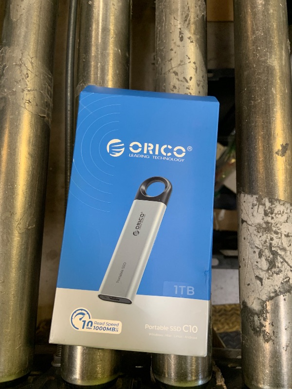 Photo 1 of ORICO 1TB External SSD Up to 1050MB/s, Hanging Hole Design Portable Solid State Drive, USB C&A 2 in 1 Cable, Reliable Storage for Type-C Smartphone, Tablets, Laptops - C10