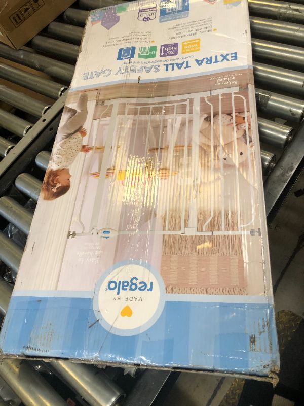 Photo 1 of Regalo Easy Step 36" Extra Tall Walk Thru Baby Gate, Includes 4-Inch Extension Kit, 4 Pack of Pressure Mount Kit and 4 Pack Wall Cups and Mounting Kit, White