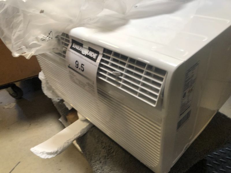 Photo 1 of Keystone 14,000 BTU Wall Mounted Air Conditioner with Supplemental Heat and Dehumidifier Function, 230V, Wall AC for Living Room and Large Rooms up to 700 Sq.Ft., Quiet, High Efficiency AC with Remote